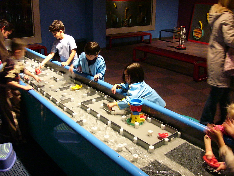 Kids exploring the water table at Science World in Vancouver
