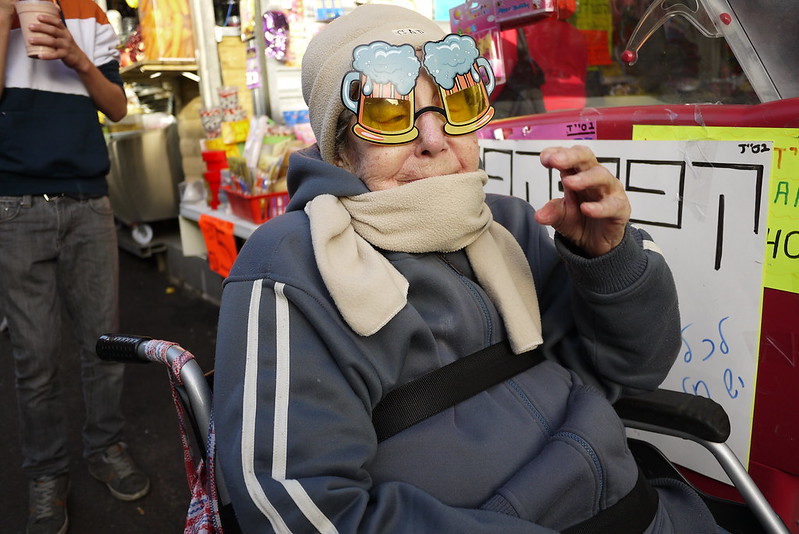 Grandma having some fun wearing beer goggles