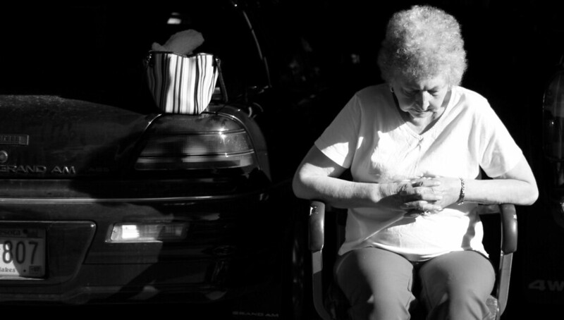 Grandma saying a prayer