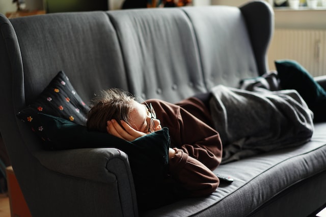 Woman napping on the couch