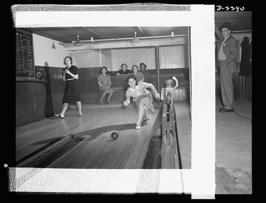 Bantam, Connecticut. In the basement of the town firehouse is the bowling alley, revenue from which helps to support the town's volunteer fire companies. Each night is alloted to a specific group, and there are several hot rivalries. Among the women shown here is Mrs. Winfield Peterson whose husband is foreman of the Warren McArthur experimental shop digital file from original neg.