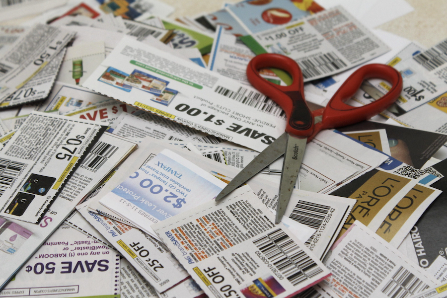 Scissors and pile of coupons