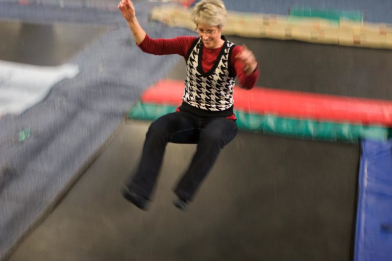 You're only as old as you feel. Photo of grandmother on trampoline
