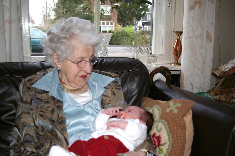 Great grandmother holding the baby