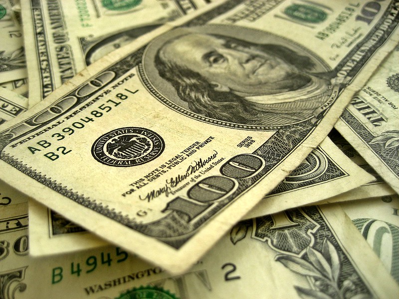 American currency and $100 dollar bill