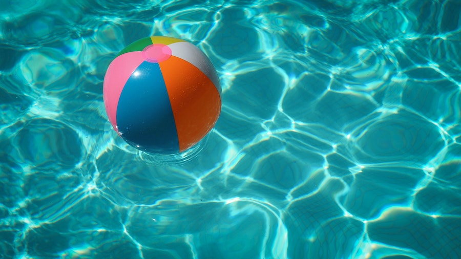 Beach ball in swimming pool